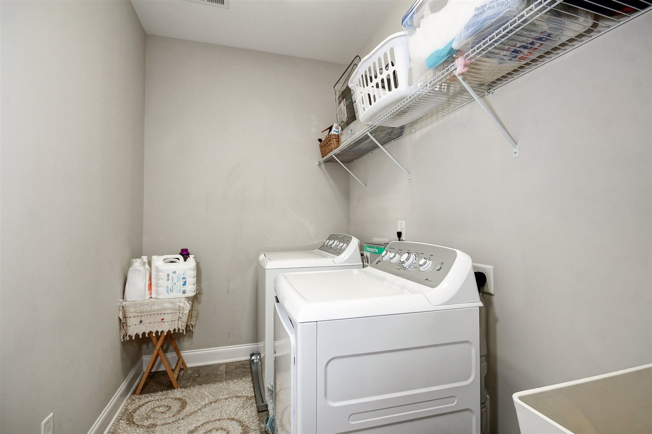 8209 Pritchett Farm Lane Raleigh, NC 27606 - Photo 23 of 30 TILED LAUNDRY w/SINK!