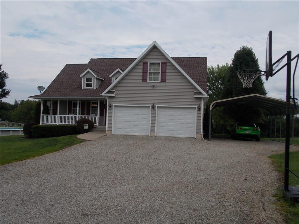 248 Buffalo Road South Washington, PA 15301 - Photo 2 of 20 Two car garage with an extra car port on the side. Just one step up to this single level home.