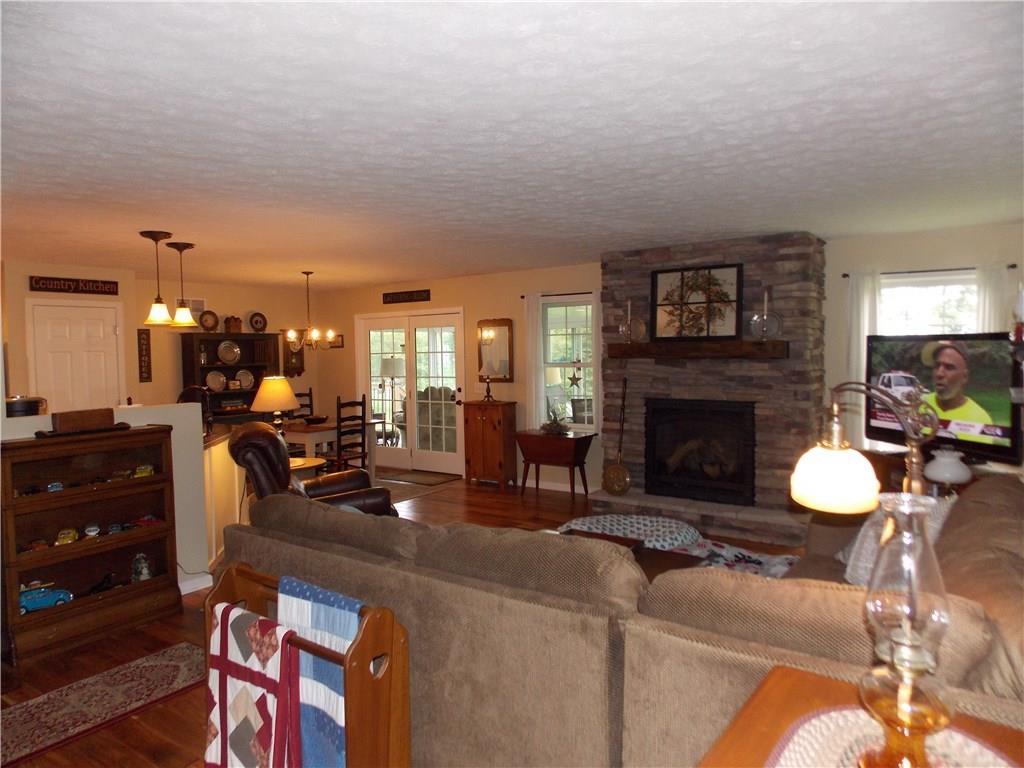 248 Buffalo Road South Washington, PA 15301 - Photo 12 of 20 Stacked stone fireplace is gas log burning.