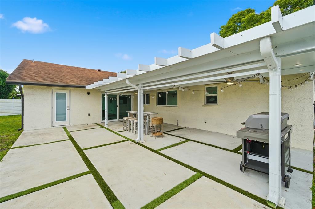 8340 Southwest 27th Place Davie, FL 33328 - Photo 20 of 25 a house view with a outdoor space