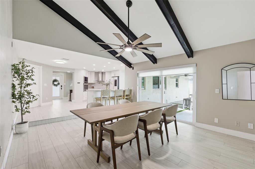 8340 Southwest 27th Place Davie, FL 33328 - Photo 2 of 25 a view of a dining room with furniture and wooden floor