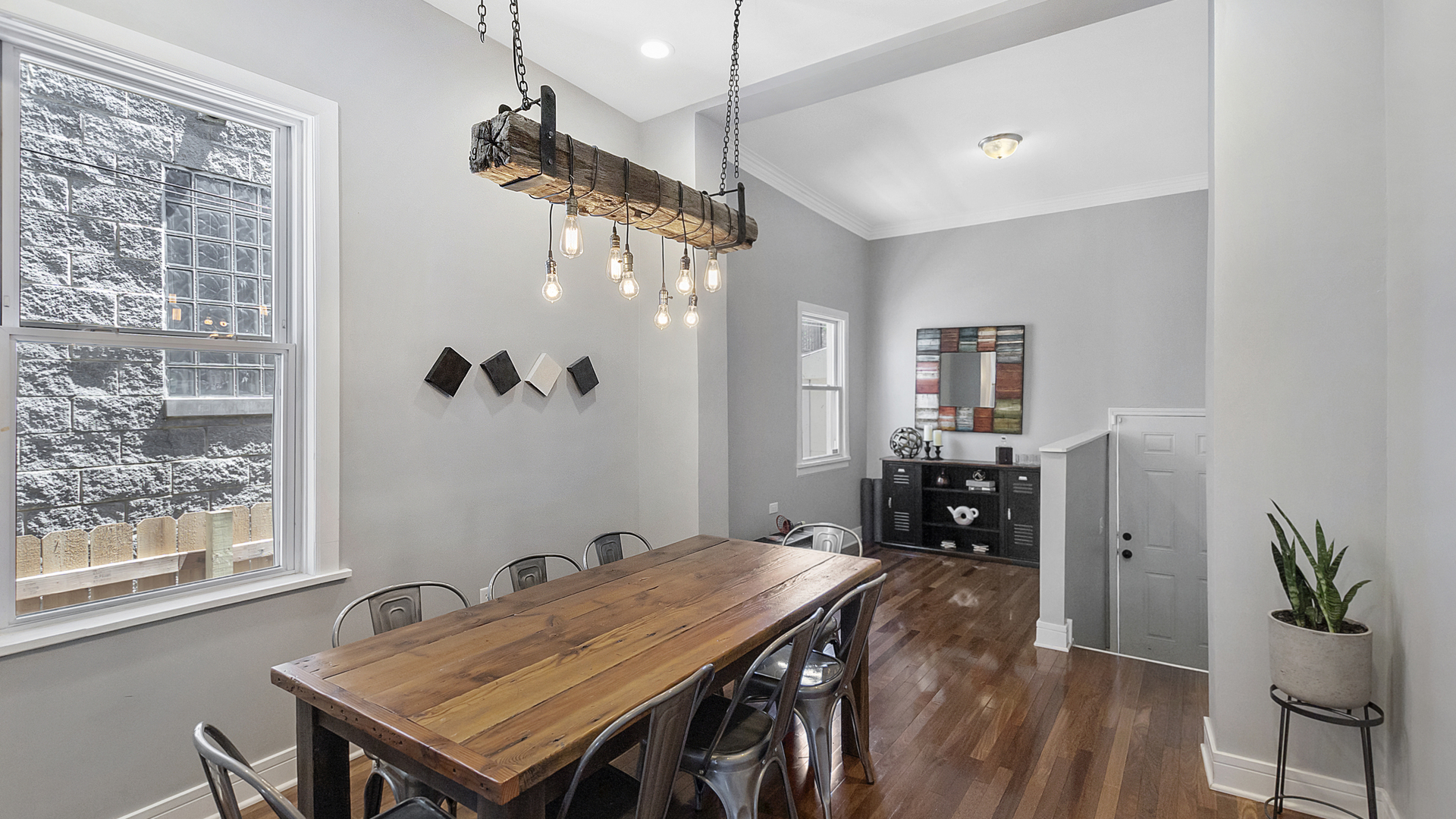 2339 West Maypole Avenue Chicago, IL 60612 - Photo 7 of 20 a view of a dining room with furniture window and wooden floor