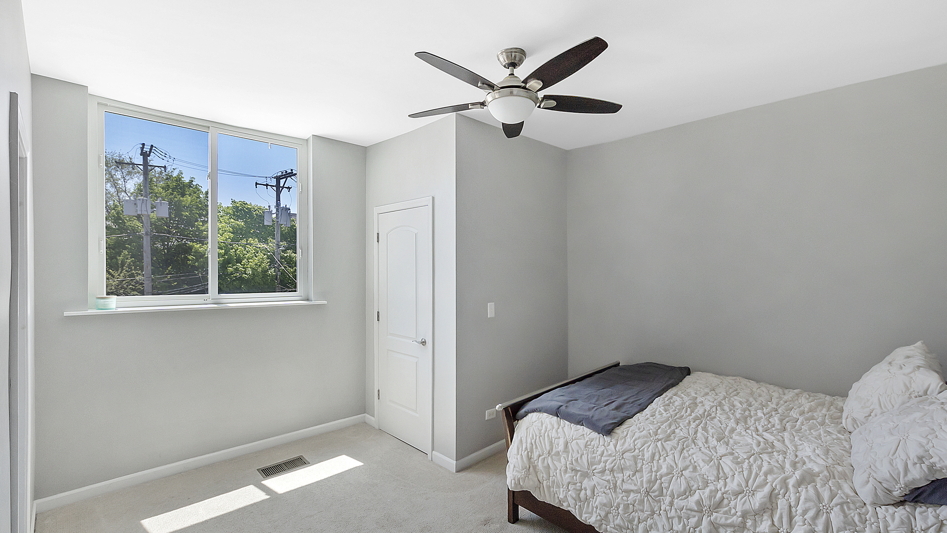 2339 West Maypole Avenue Chicago, IL 60612 - Photo 9 of 20 a bedroom with a bed and a window