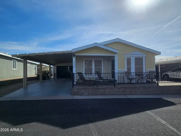 a front view of a house with a porch