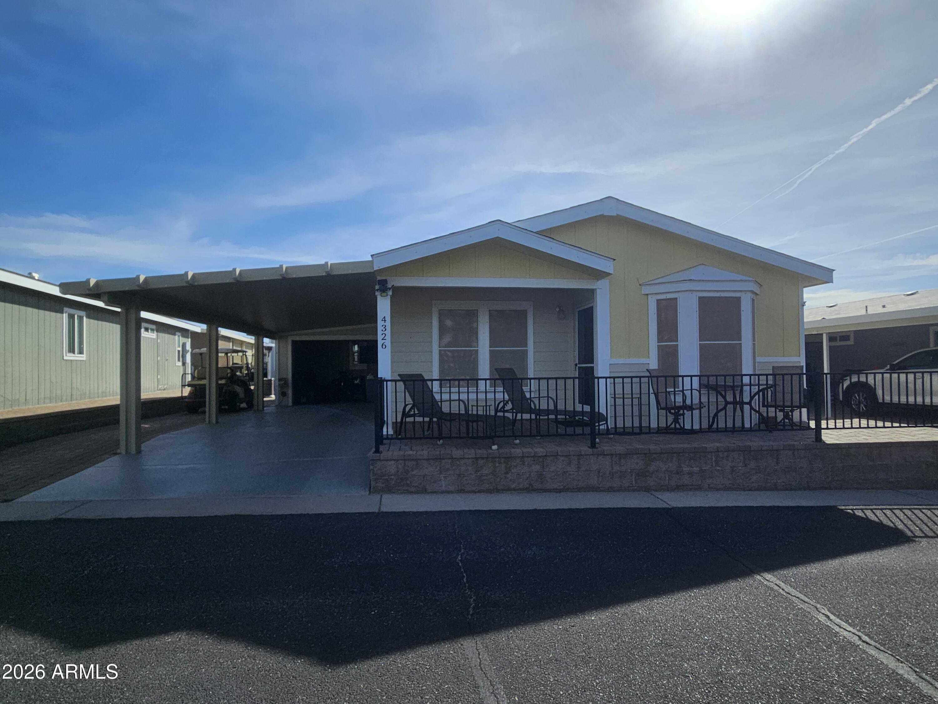 a front view of a house with a porch