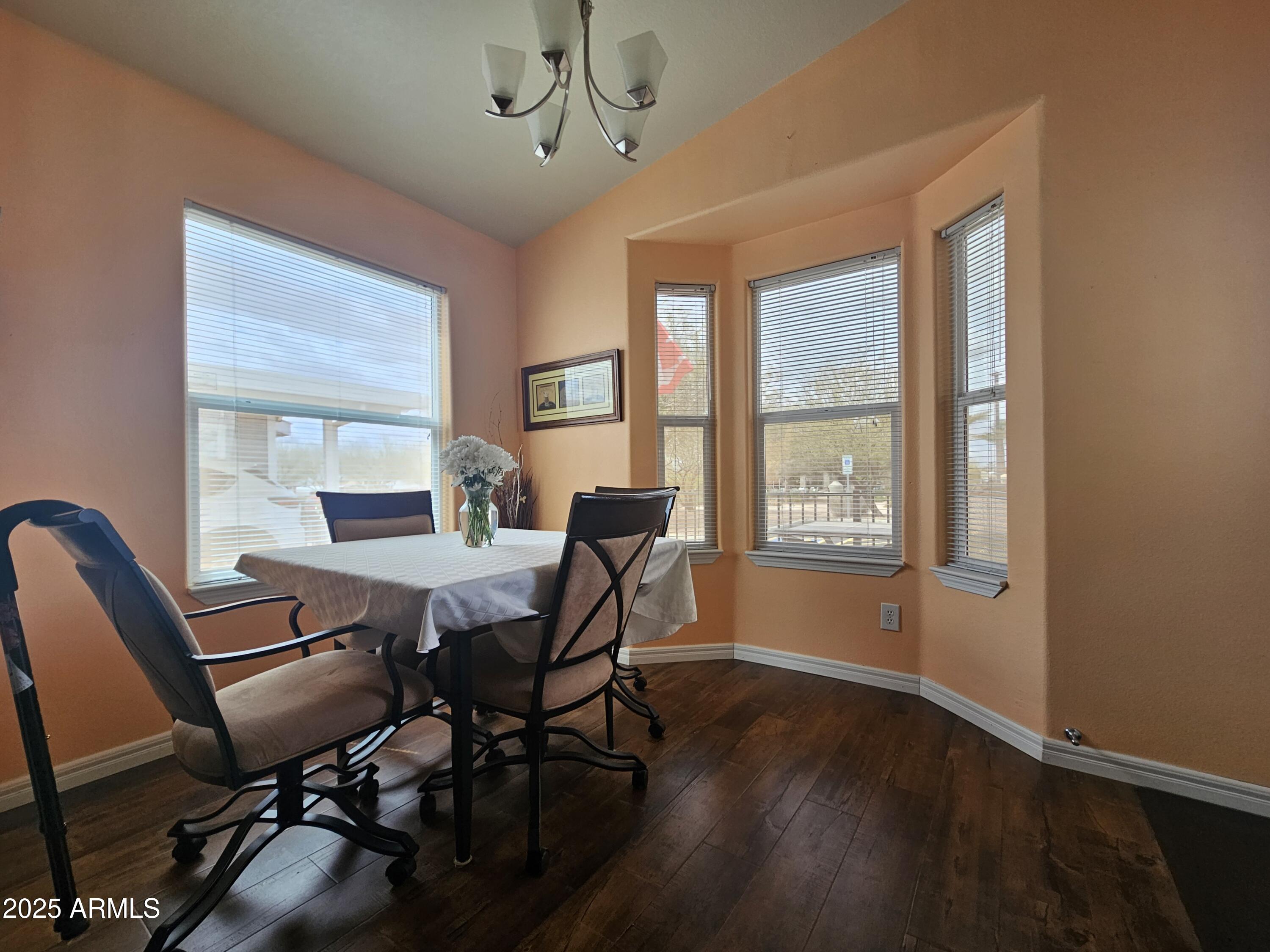 650 North Hawes Road, Unit 4326 Mesa, AZ 85207 - Photo 17 of 48 a view of a dining room with furniture window and outside view