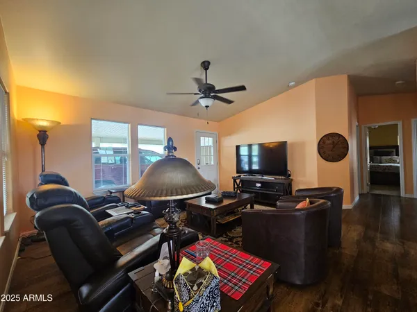 a living room with furniture and a window