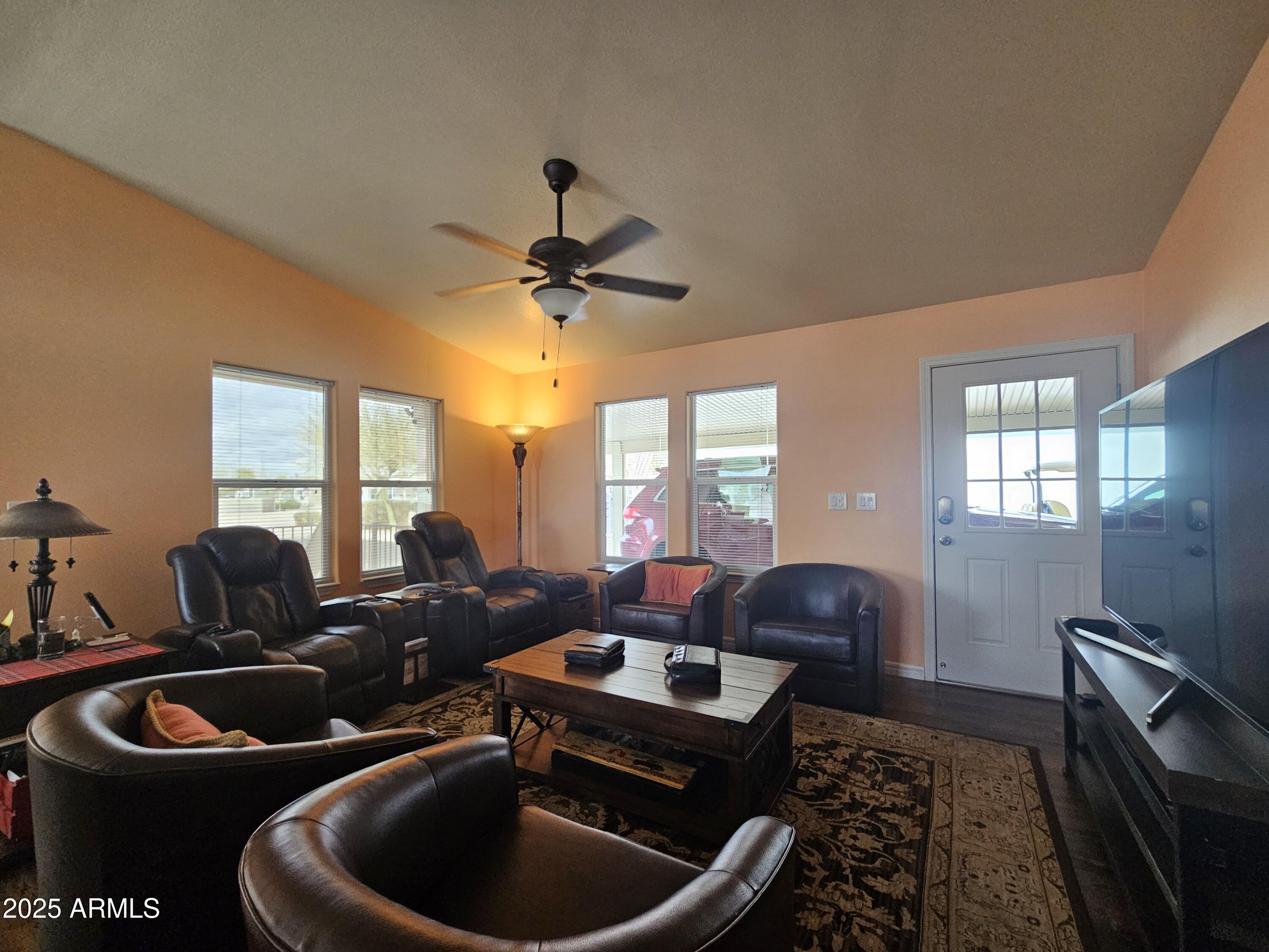 650 North Hawes Road, Unit 4326 Mesa, AZ 85207 - Photo 20 of 48 a living room with furniture and a window