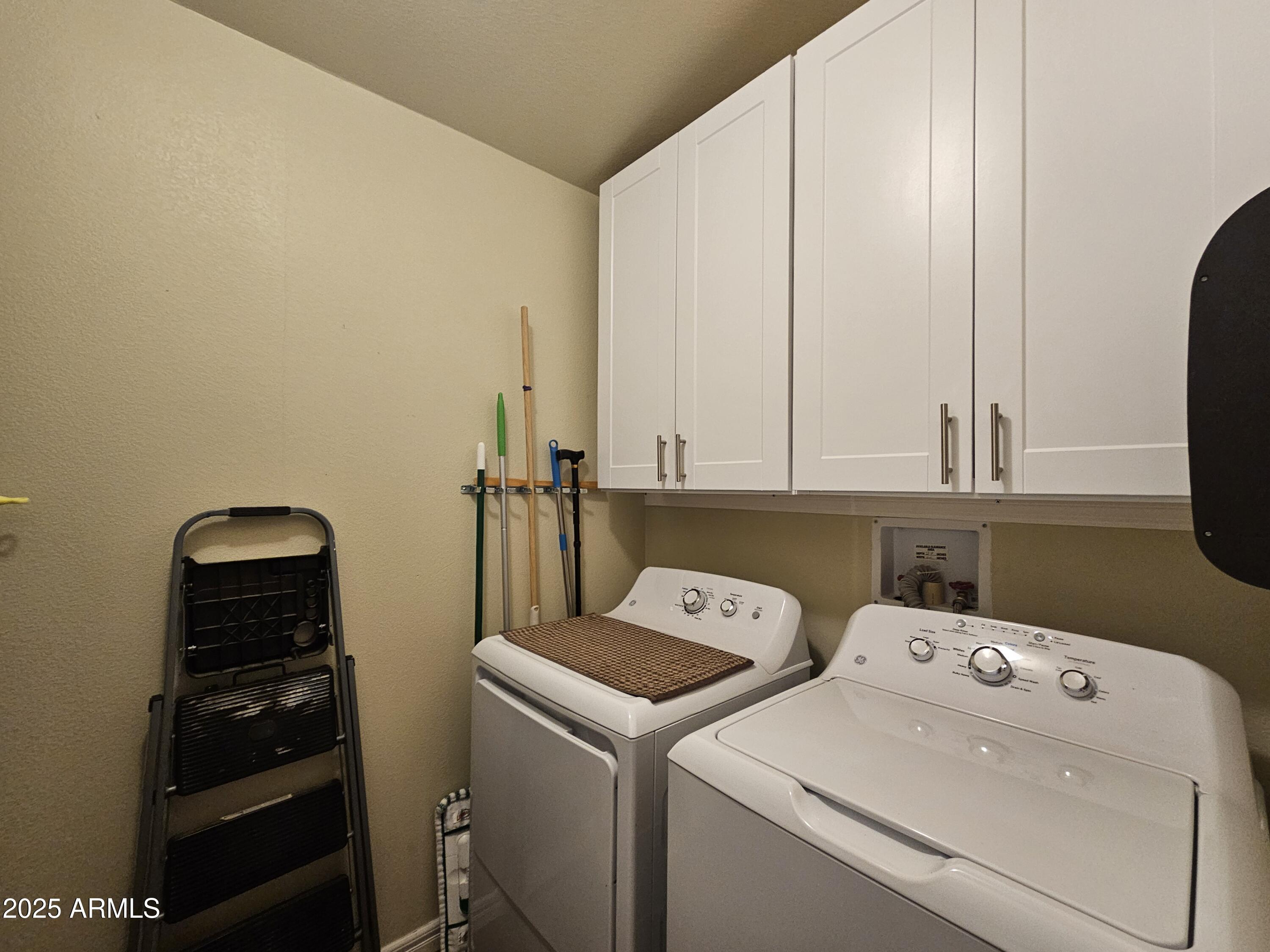 650 North Hawes Road, Unit 4326 Mesa, AZ 85207 - Photo 30 of 48 a utility room with dryer and washer