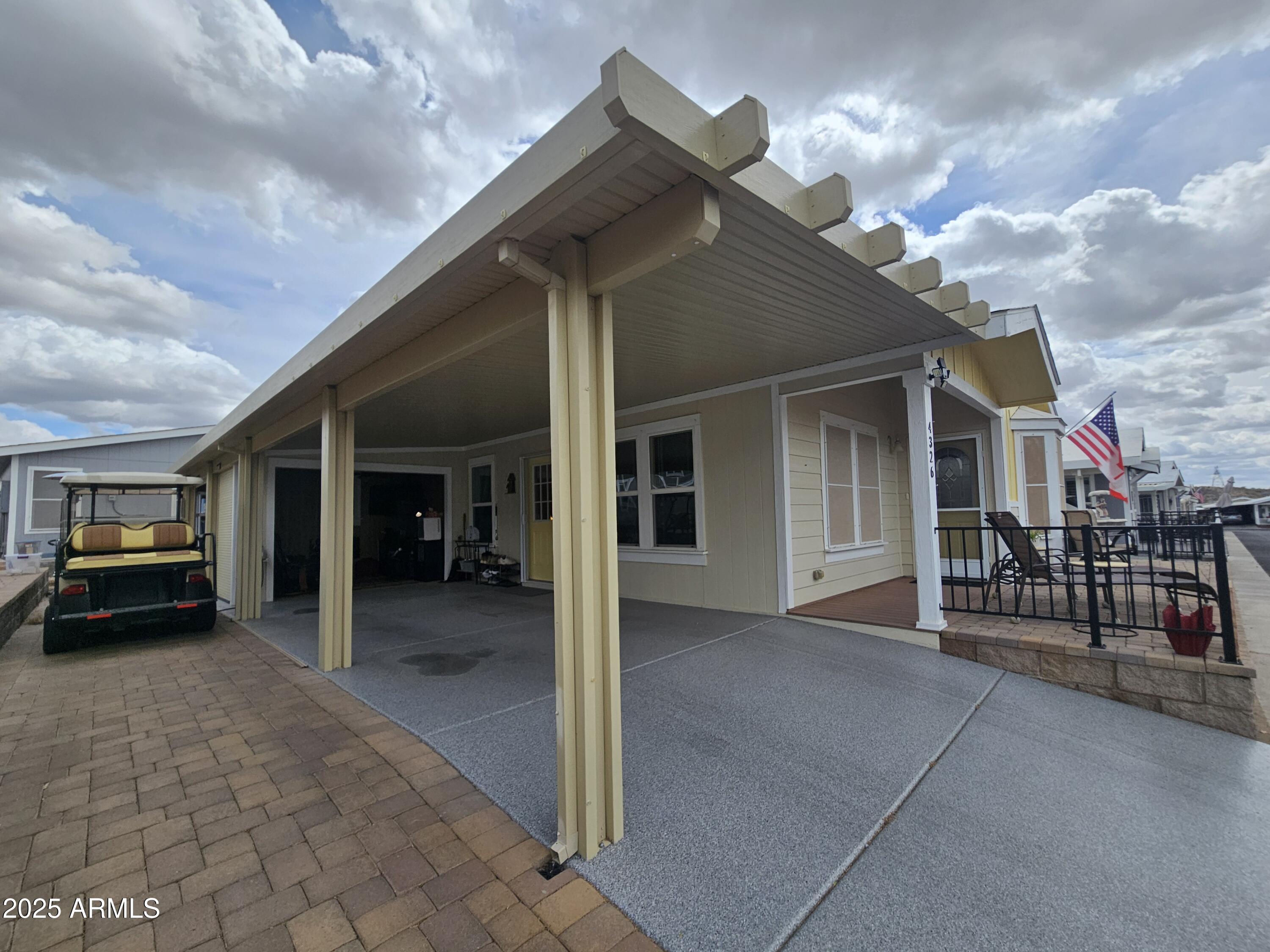 650 North Hawes Road, Unit 4326 Mesa, AZ 85207 - Photo 35 of 48 a car parked in front of house