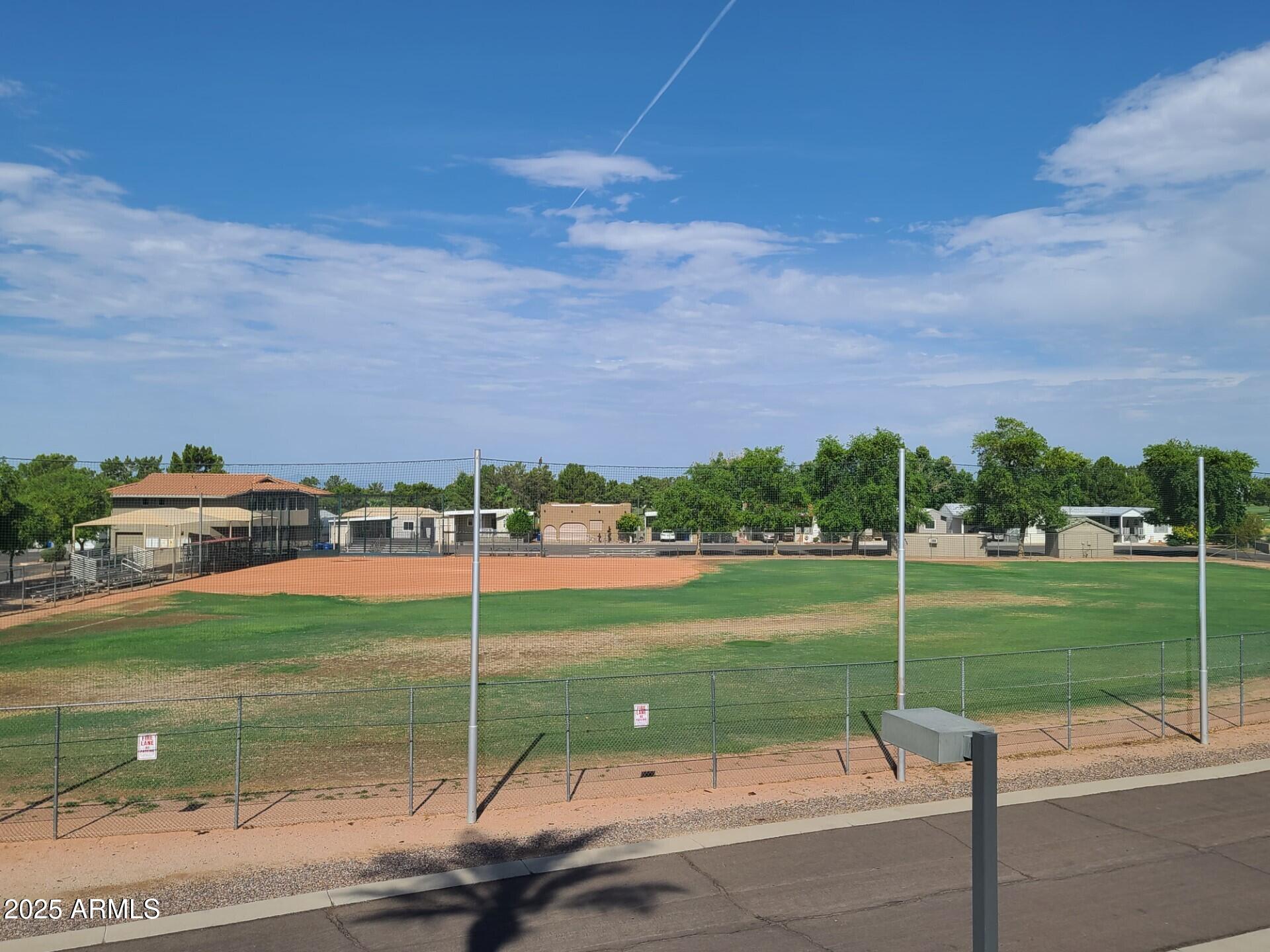 650 North Hawes Road, Unit 4326 Mesa, AZ 85207 - Photo 45 of 48 a view of a park with slide on the table