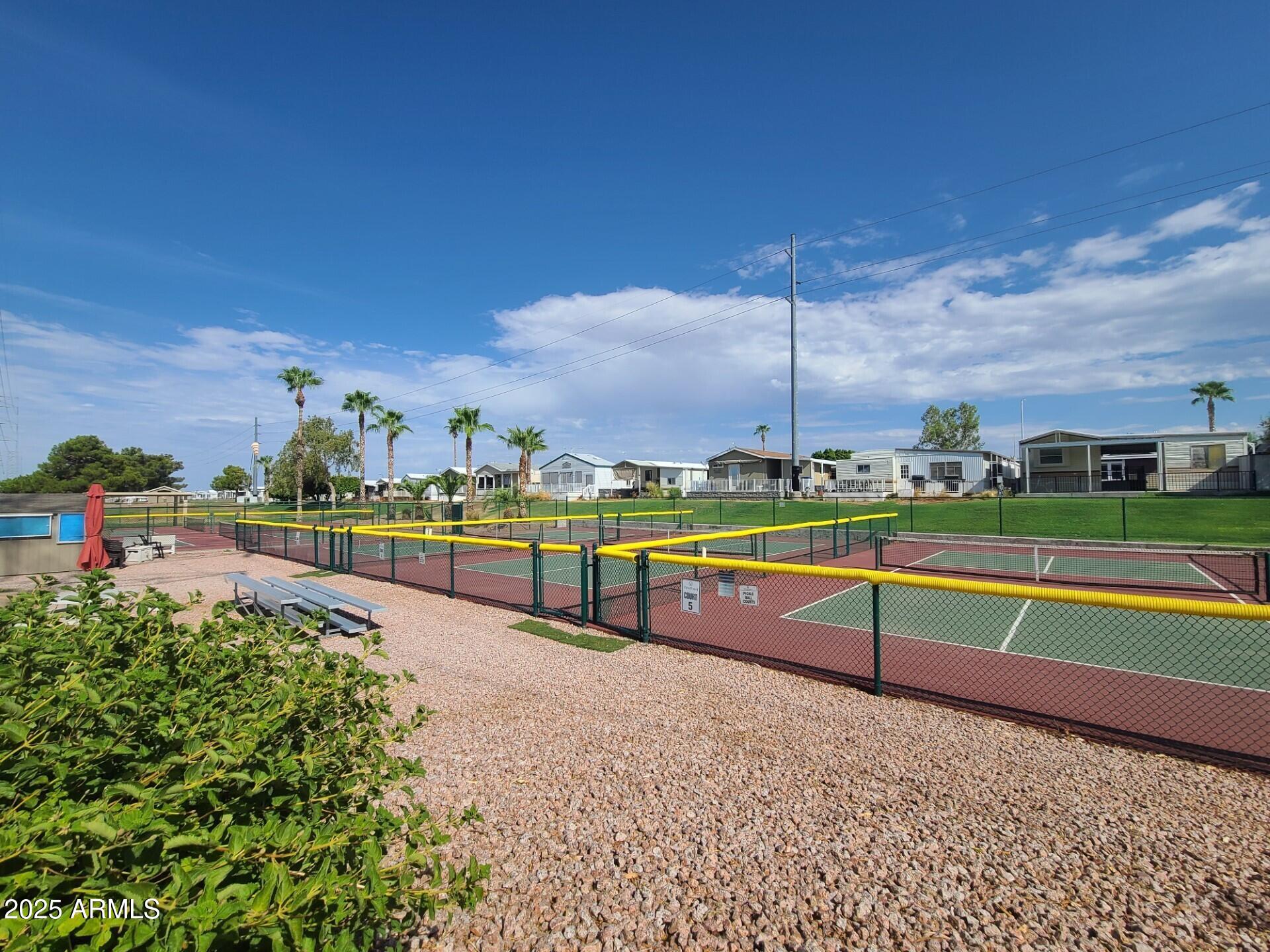650 North Hawes Road, Unit 4326 Mesa, AZ 85207 - Photo 46 of 48 a view of a swimming pool with an outdoor seating