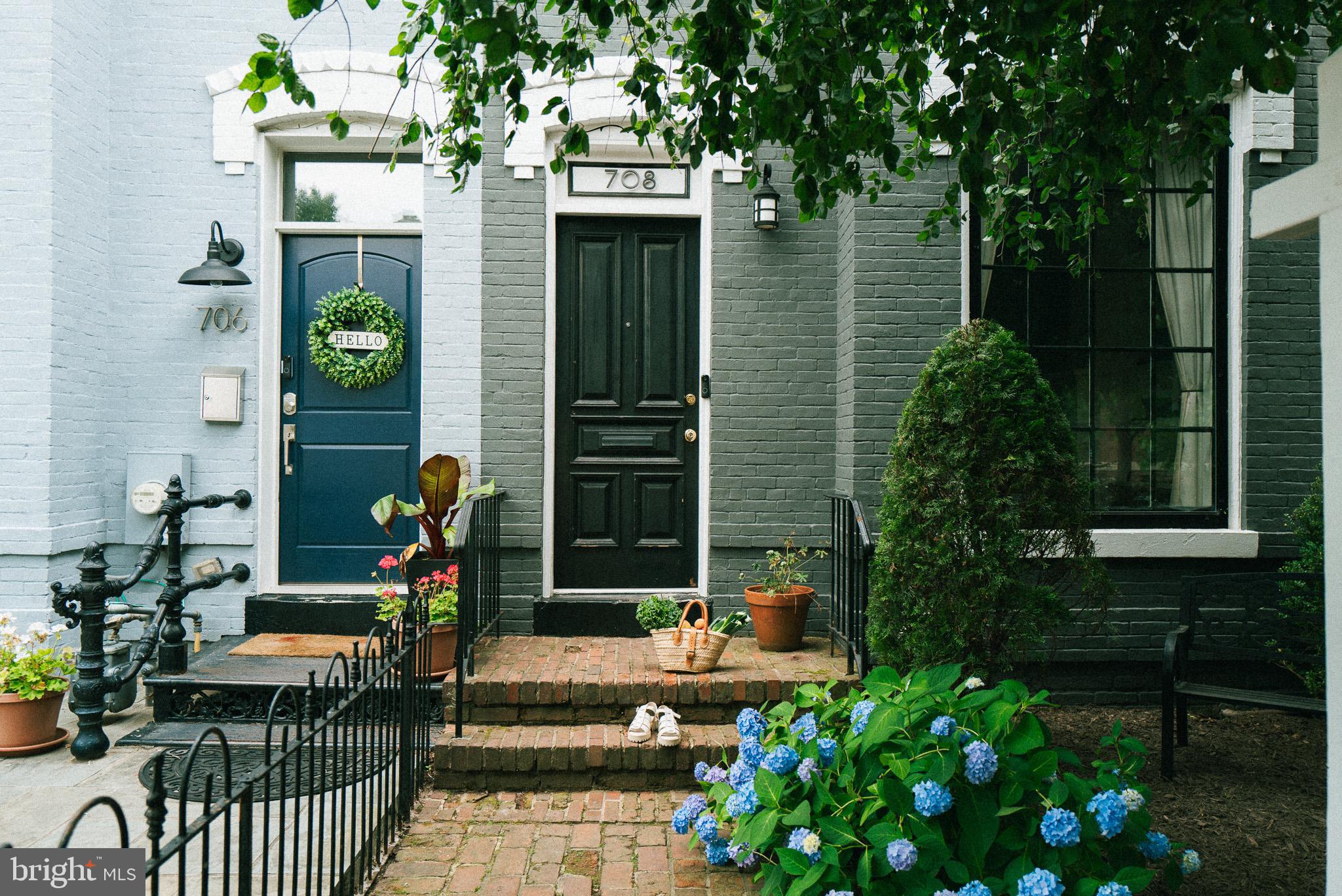708 9th Street Southeast Washington, DC 20003 - Photo 1 of 31 a front view of a house with outdoor seating