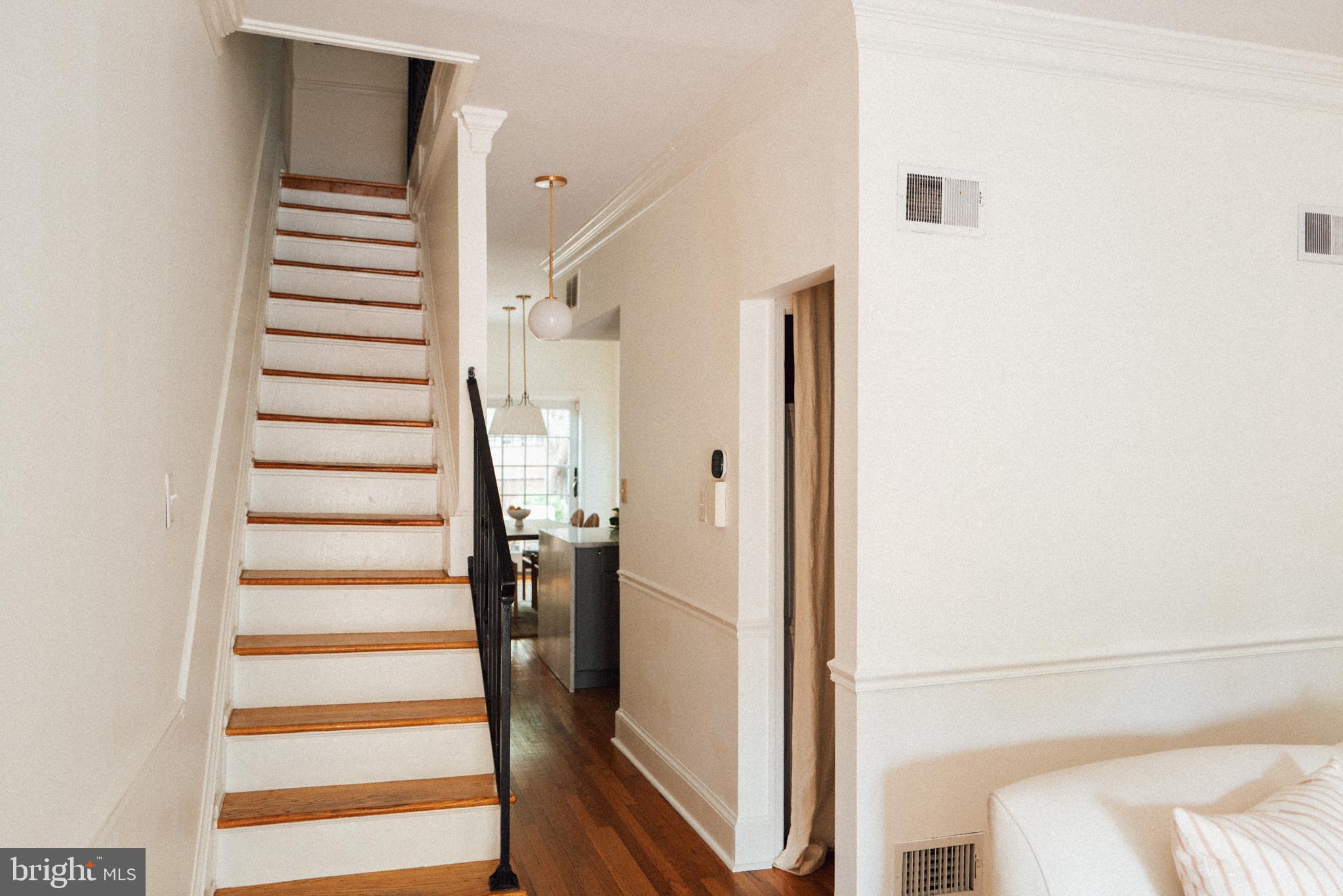 708 9th Street Southeast Washington, DC 20003 - Photo 15 of 31 a view of entryway with stairs and wooden floor