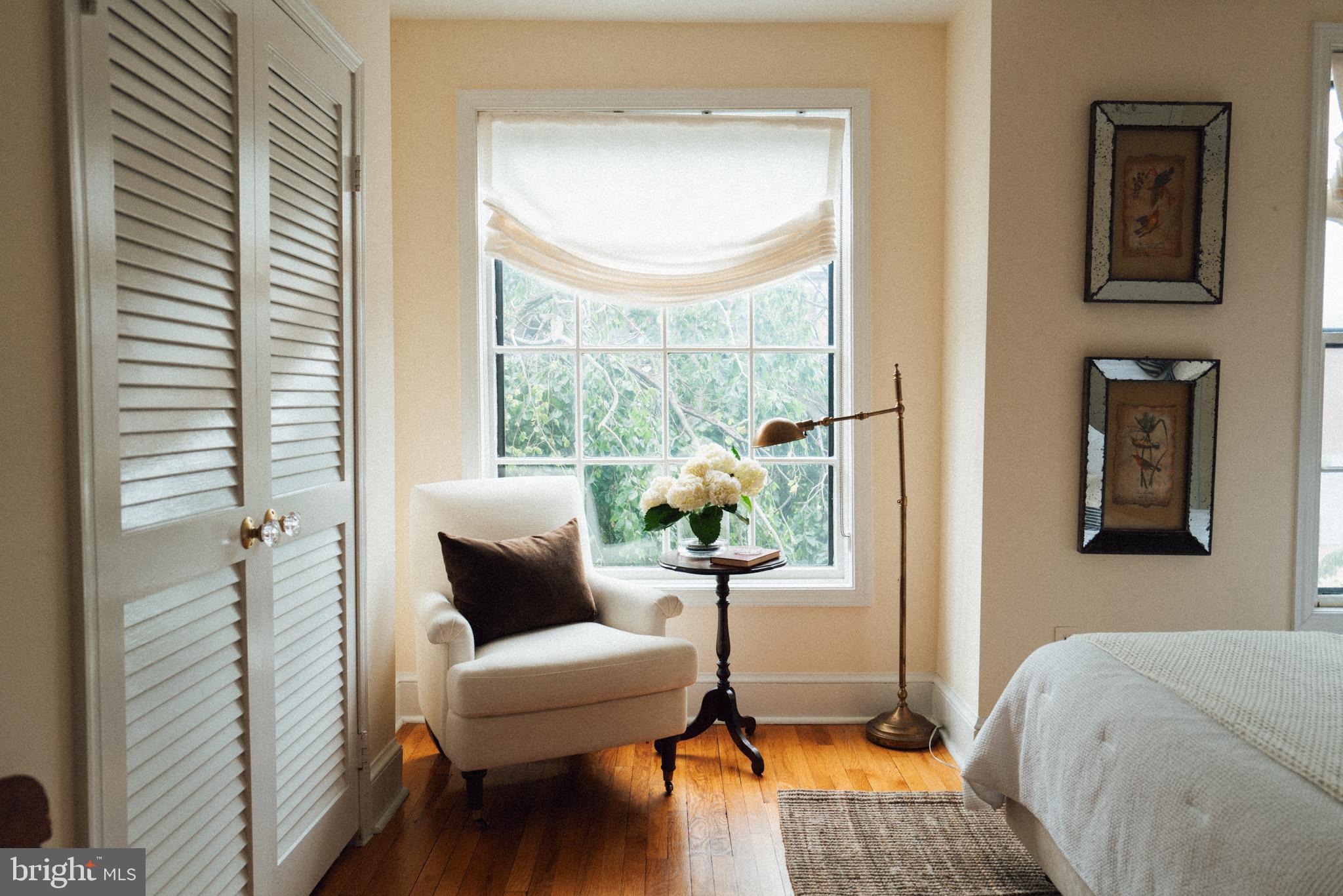 708 9th Street Southeast Washington, DC 20003 - Photo 19 of 31 a living room with furniture and a window