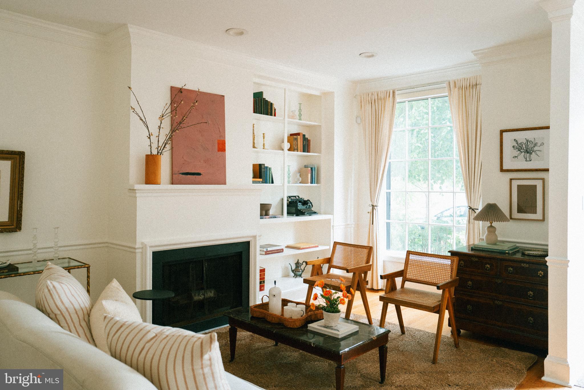 708 9th Street Southeast Washington, DC 20003 - Photo 2 of 31 a living room with furniture and a fireplace