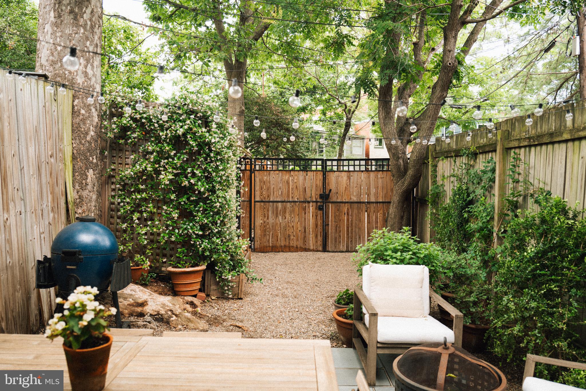 708 9th Street Southeast Washington, DC 20003 - Photo 29 of 31 a view of a chairs and table in backyard