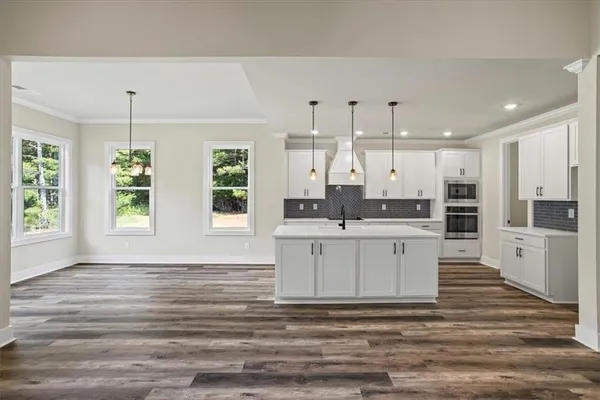 a white bath tub sitting in a bathroom
