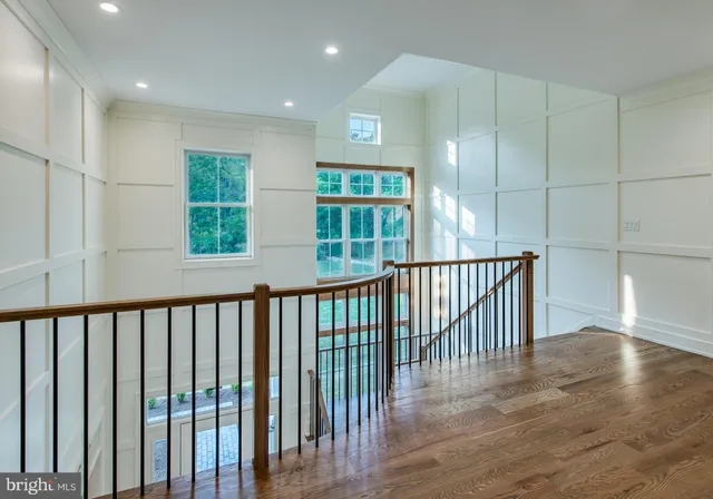 a view of a hallway with windows