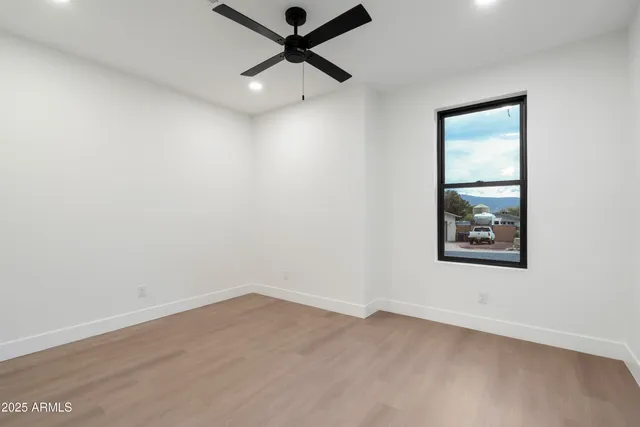 a bathroom with a shower sink and mirror