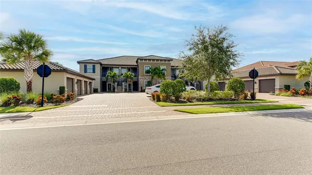 a view of a house with outdoor seating space