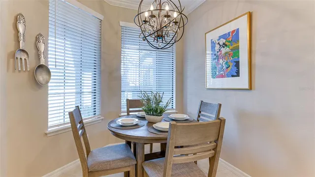 a bathroom with a granite countertop sink a mirror and shower