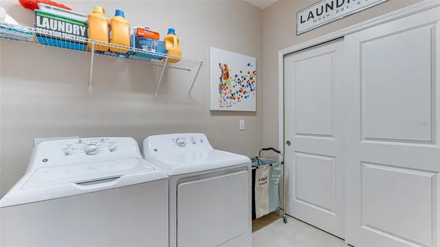 a view of an chairs and table in the patio