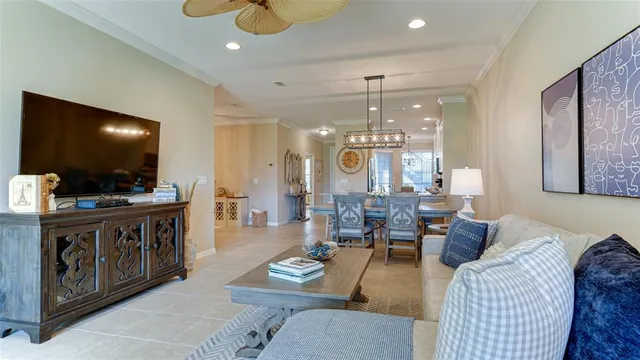 a kitchen with kitchen island granite countertop a table and chairs