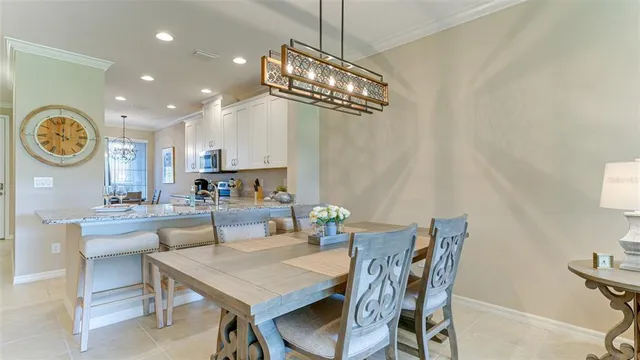 a kitchen with stainless steel appliances granite countertop a sink and a stove