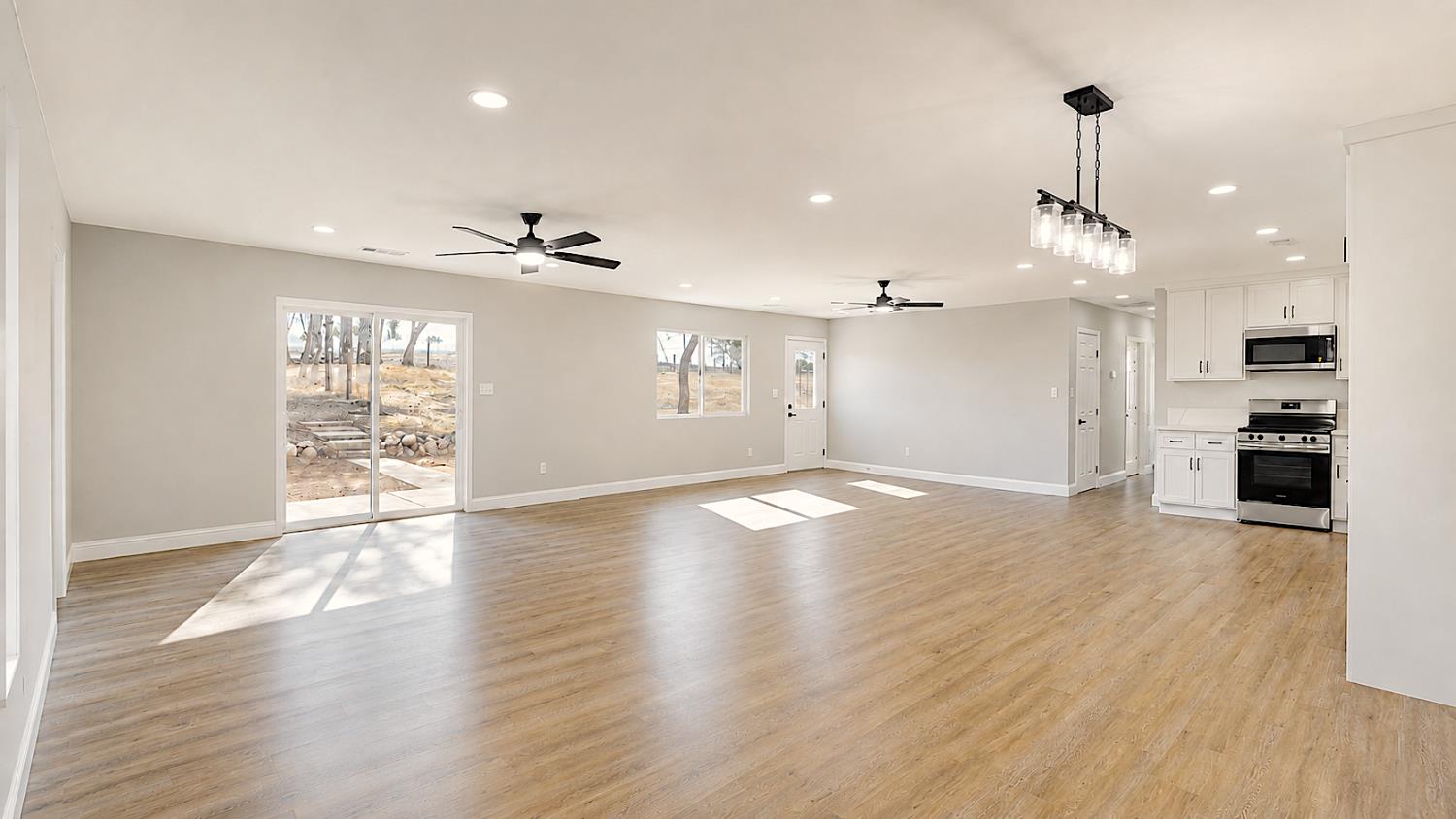 4728 Zorro Road La Grange, CA 95329 - Photo 16 of 56 Spacious interior featuring wood-finish flooring, recessed lighting, and ceiling fans