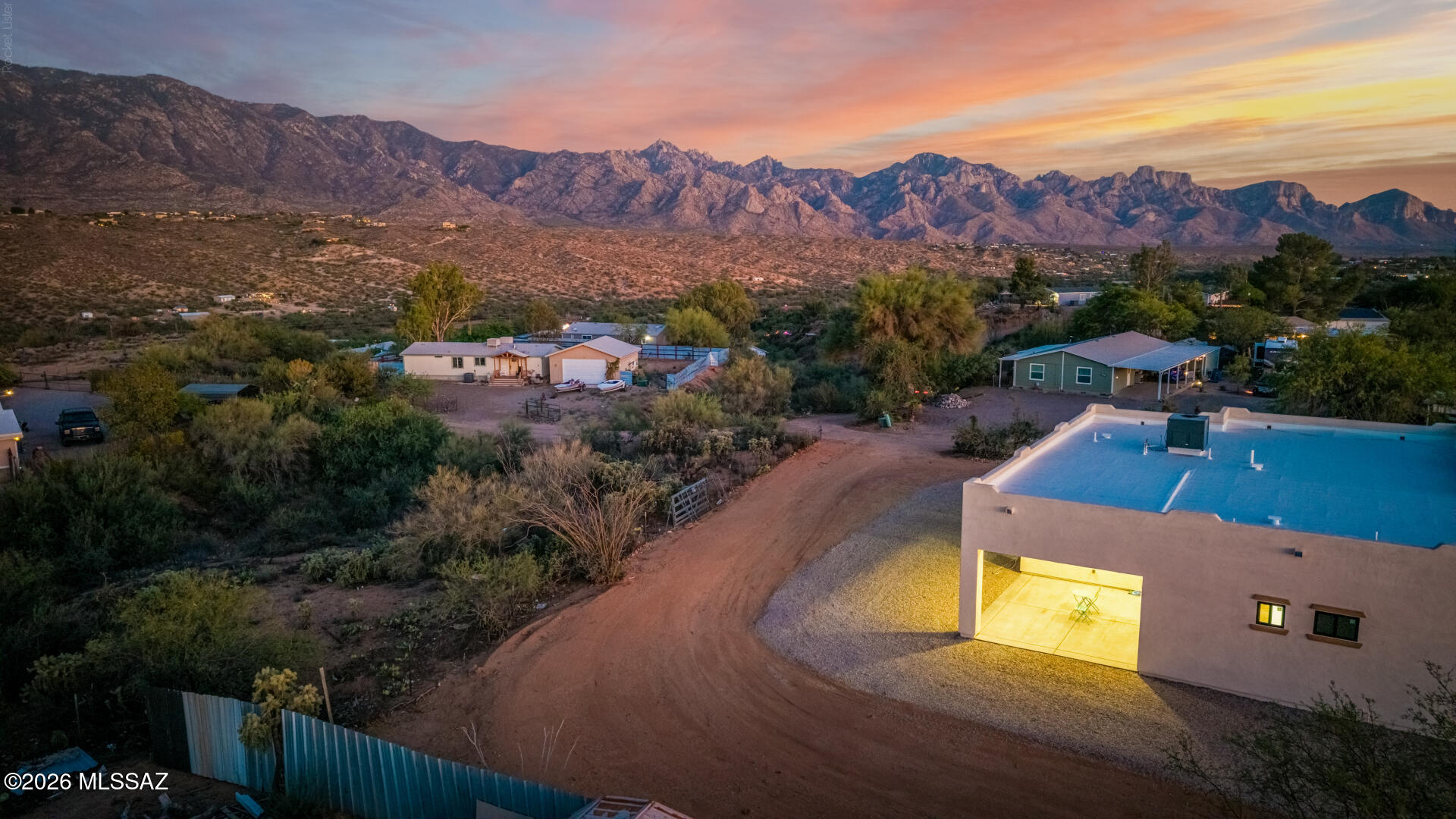 4601 East Magoo Road Tucson, AZ 85739 - Photo 29 of 38 a view of a city with mountains in the background