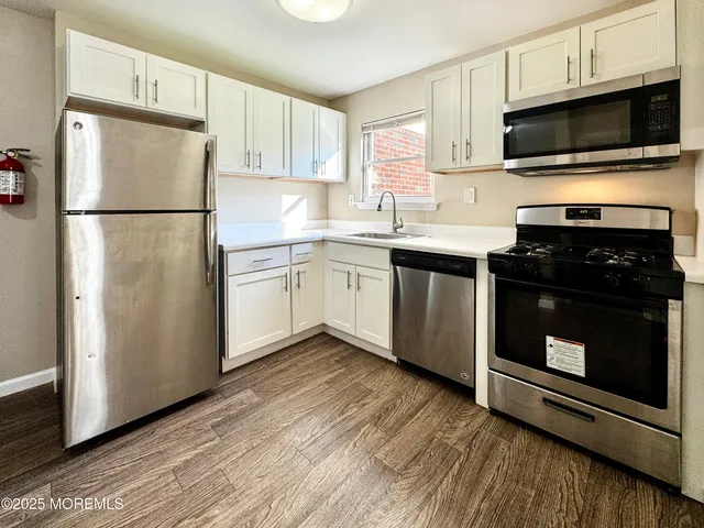 a view of bathroom with a toilet and a shower