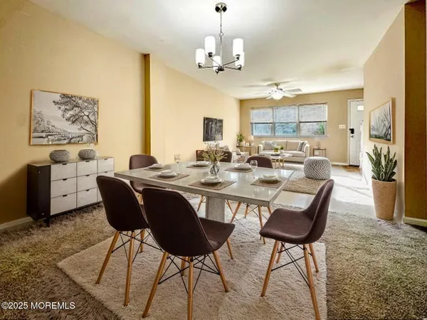a view of a kitchen from the hallway