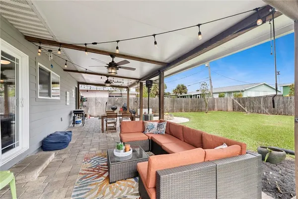 a outdoor space with lots of tables and chairs