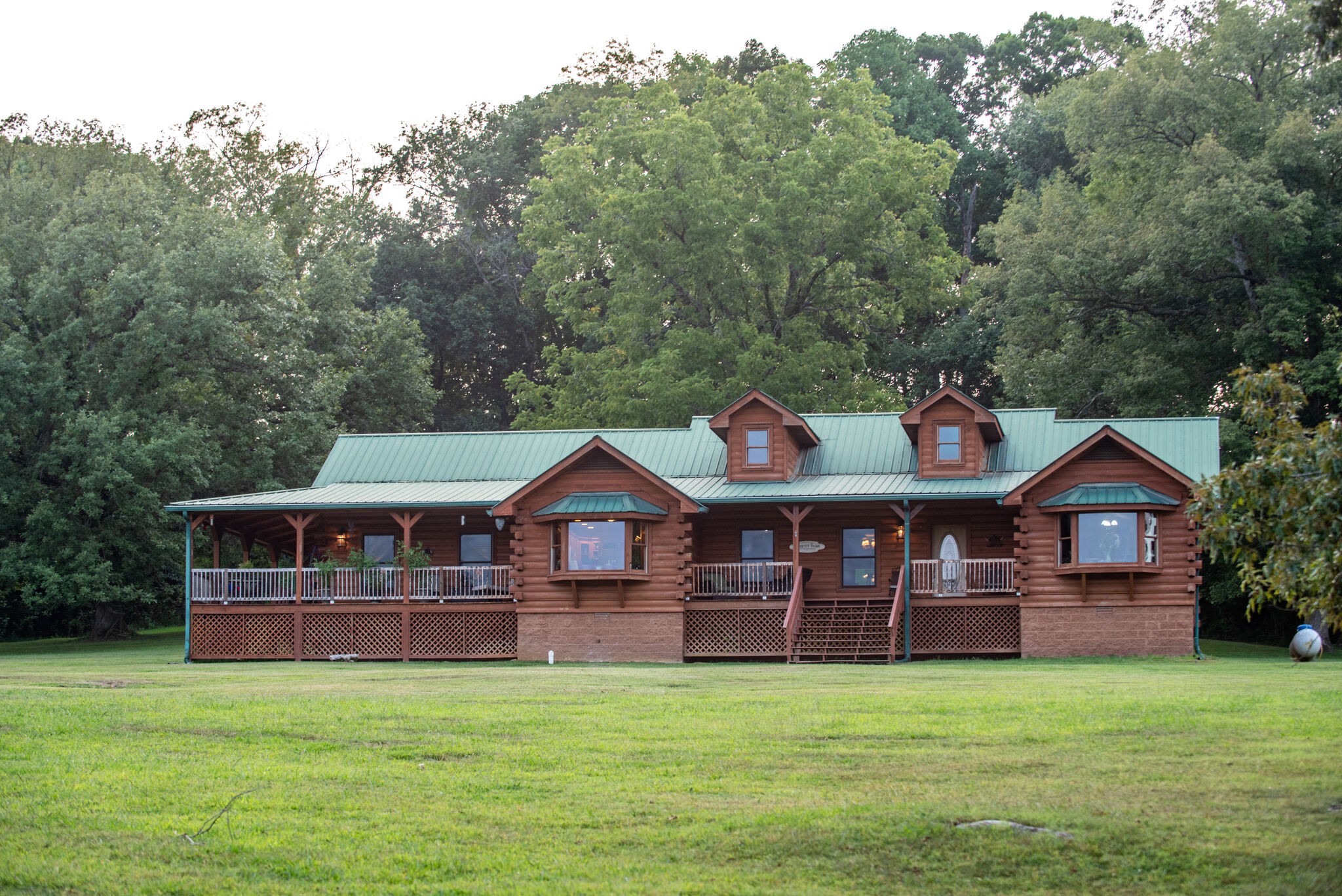 1946 Mann Road Lebanon, TN 37087 - Photo 12 of 50 a front view of a house with garden and trees