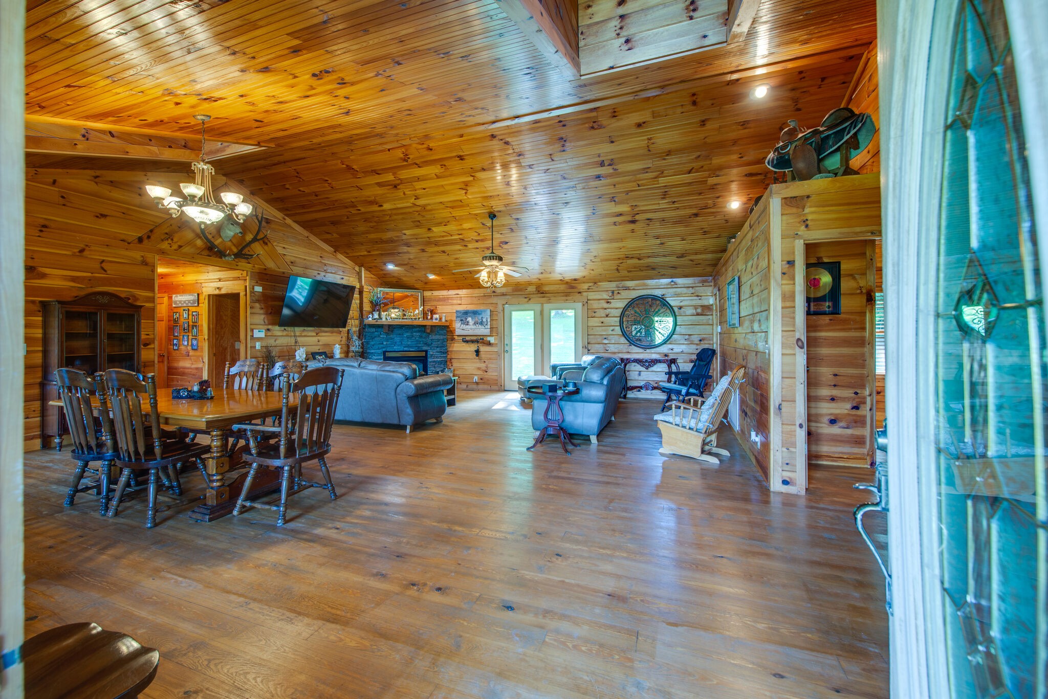 1946 Mann Road Lebanon, TN 37087 - Photo 17 of 50 a view of a patio with dining table and chairs with wooden floor