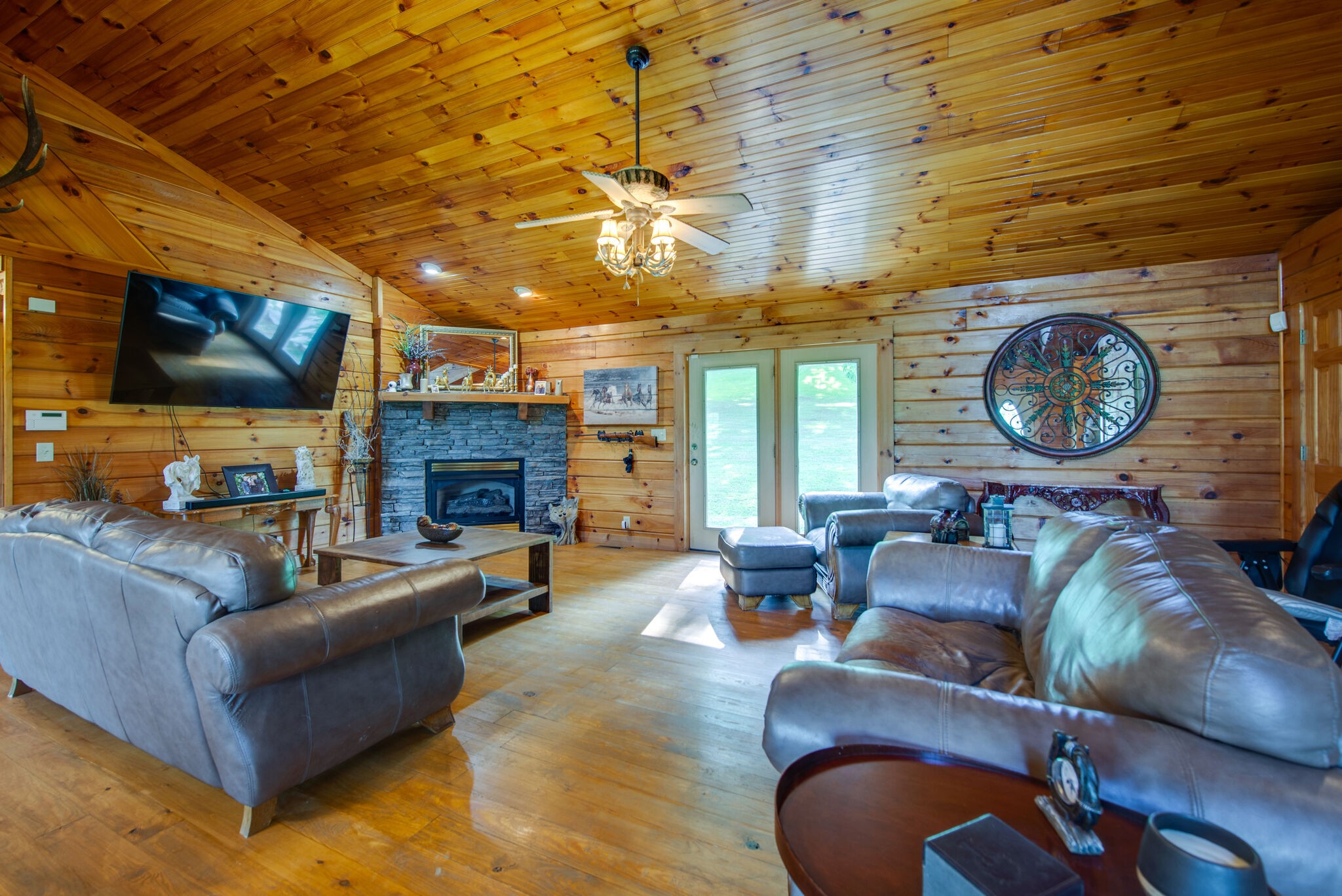 1946 Mann Road Lebanon, TN 37087 - Photo 18 of 50 a living room with fireplace furniture and a flat screen tv