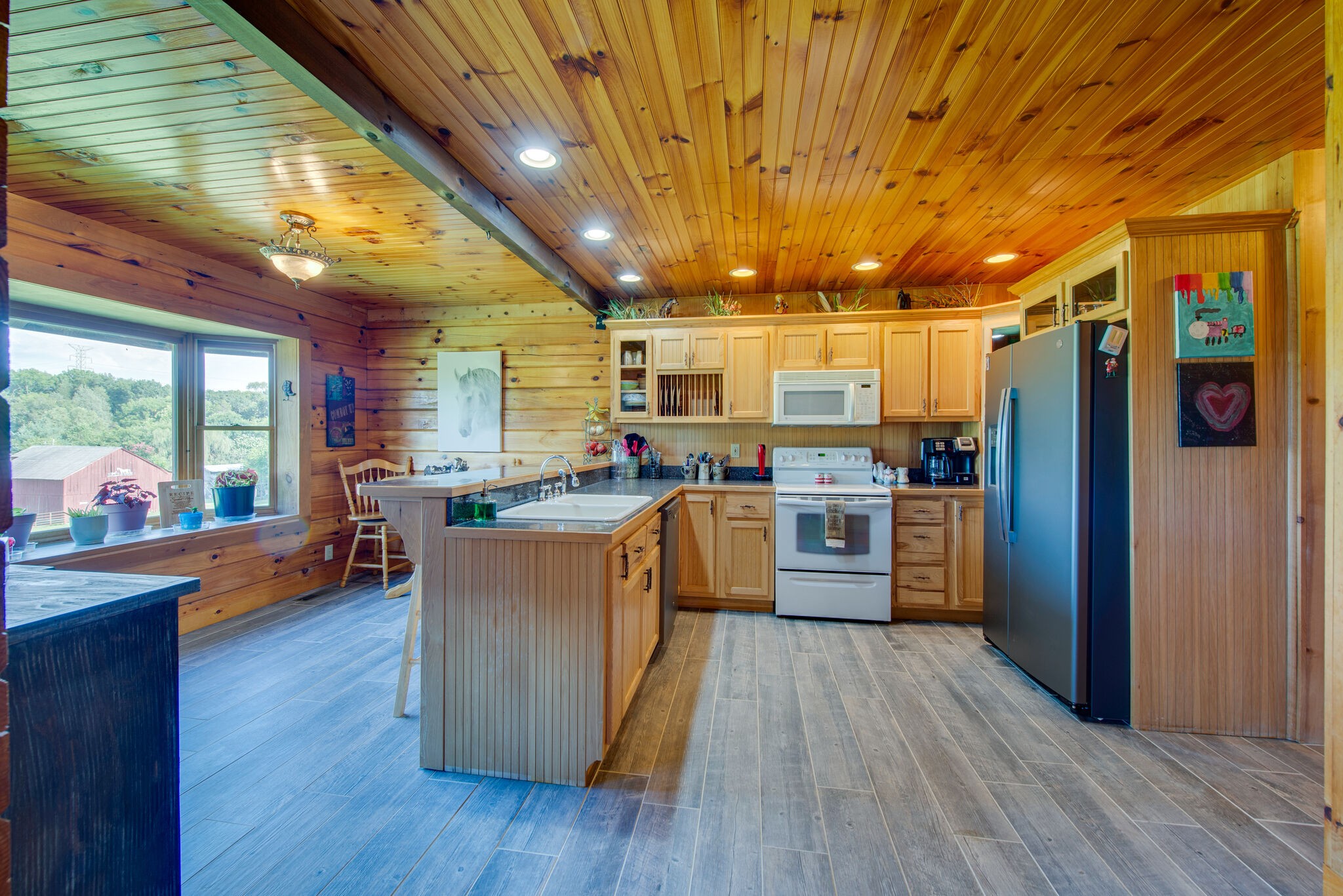 1946 Mann Road Lebanon, TN 37087 - Photo 23 of 50 a kitchen with lots of counter top space and stainless steel appliances