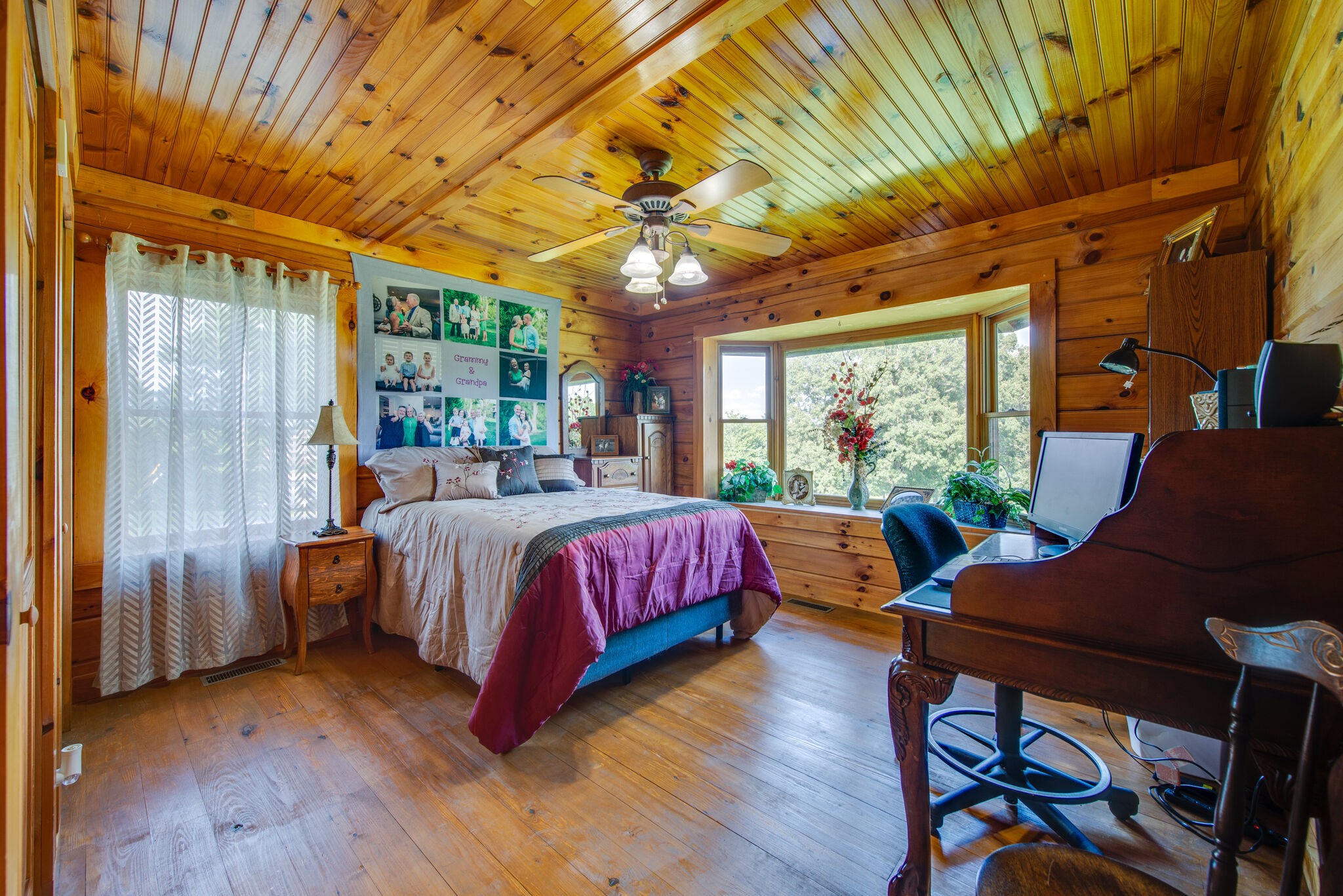 1946 Mann Road Lebanon, TN 37087 - Photo 27 of 50 a bedroom with a bed and wooden floor