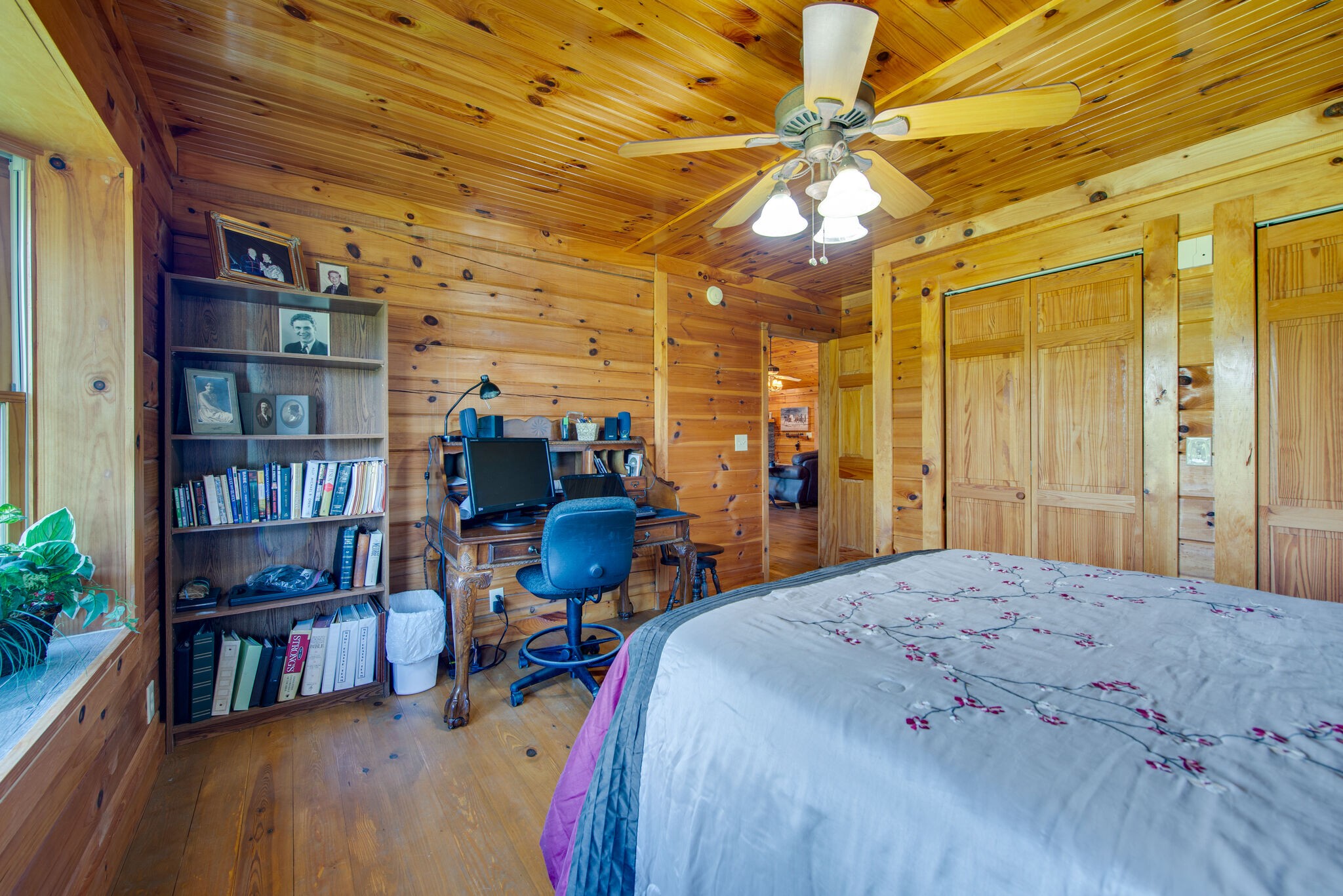 1946 Mann Road Lebanon, TN 37087 - Photo 28 of 50 a bed room with a bed and a book shelf