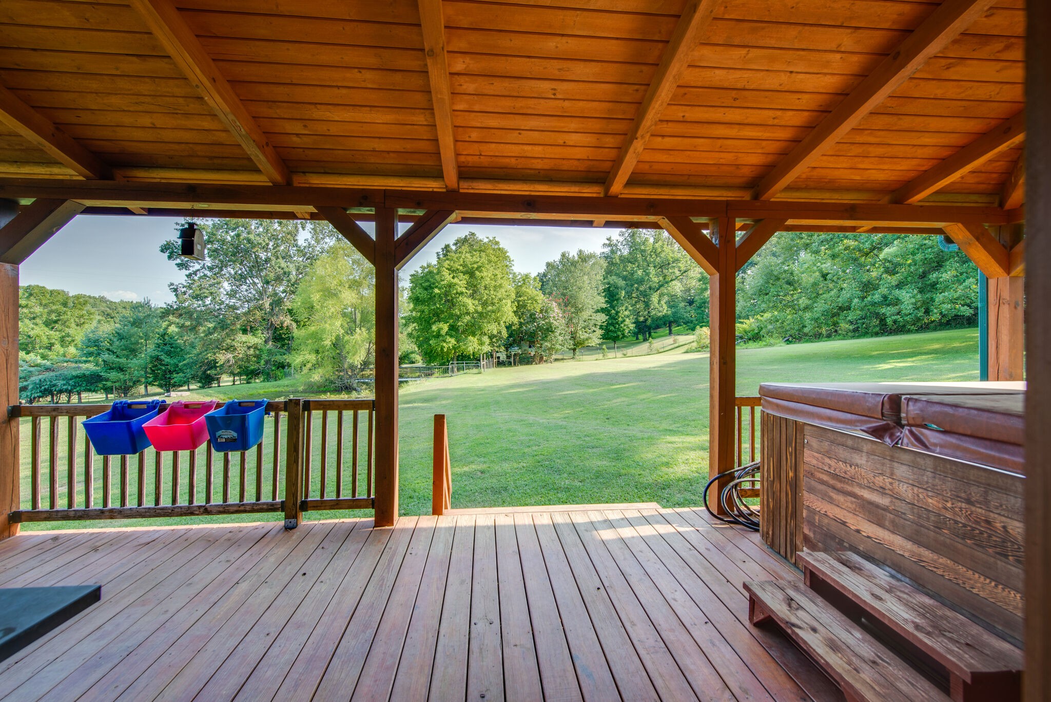 1946 Mann Road Lebanon, TN 37087 - Photo 39 of 50 a view of a deck with wooden floor and roof with a garden view