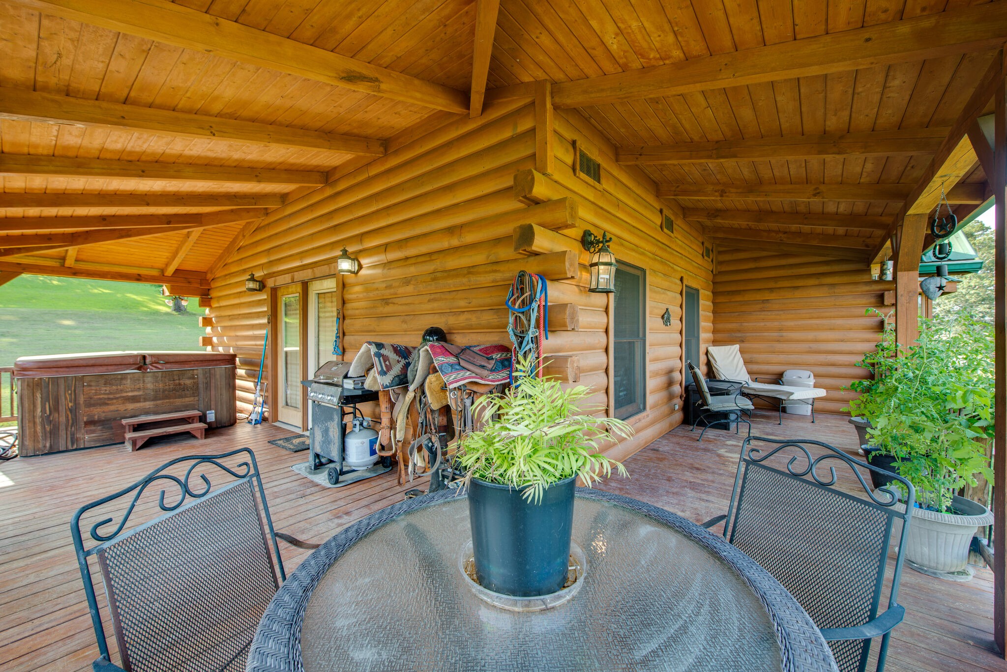 1946 Mann Road Lebanon, TN 37087 - Photo 40 of 50 a view of a patio with table and chairs potted plants