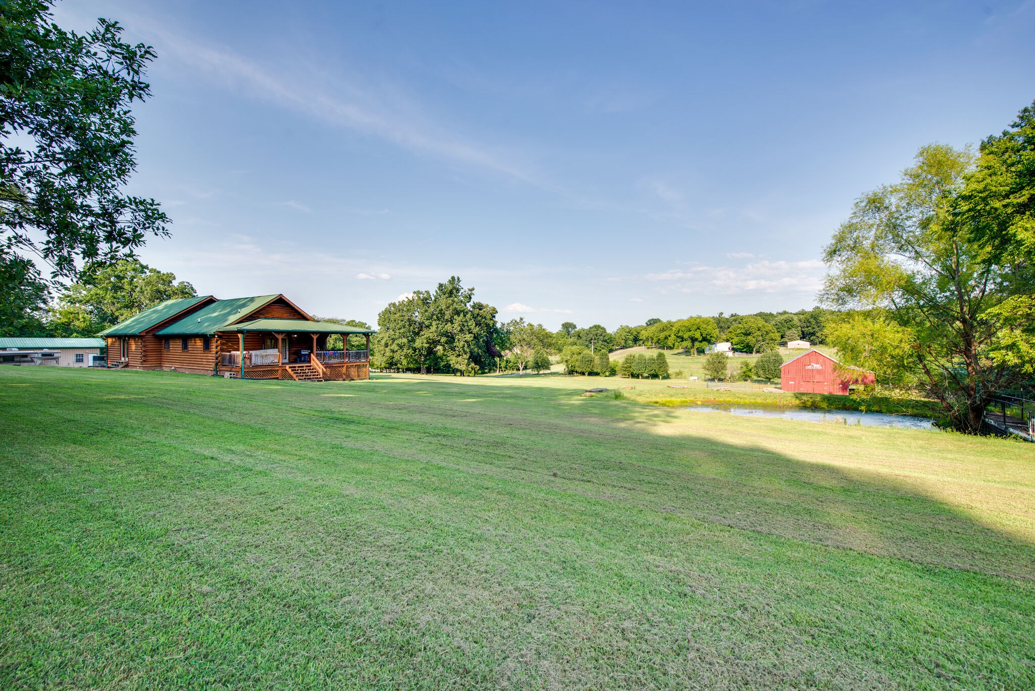 1946 Mann Road Lebanon, TN 37087 - Photo 45 of 50 a view of green field with house in background