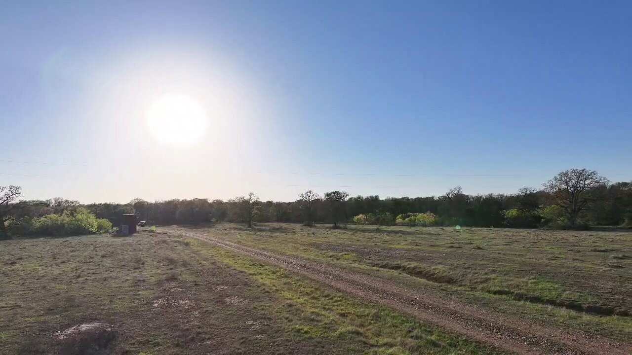 Tbd Lot 3 Tbd Road Paige, TX 78659 - Photo 14 of 15 a view of a field with trees in background