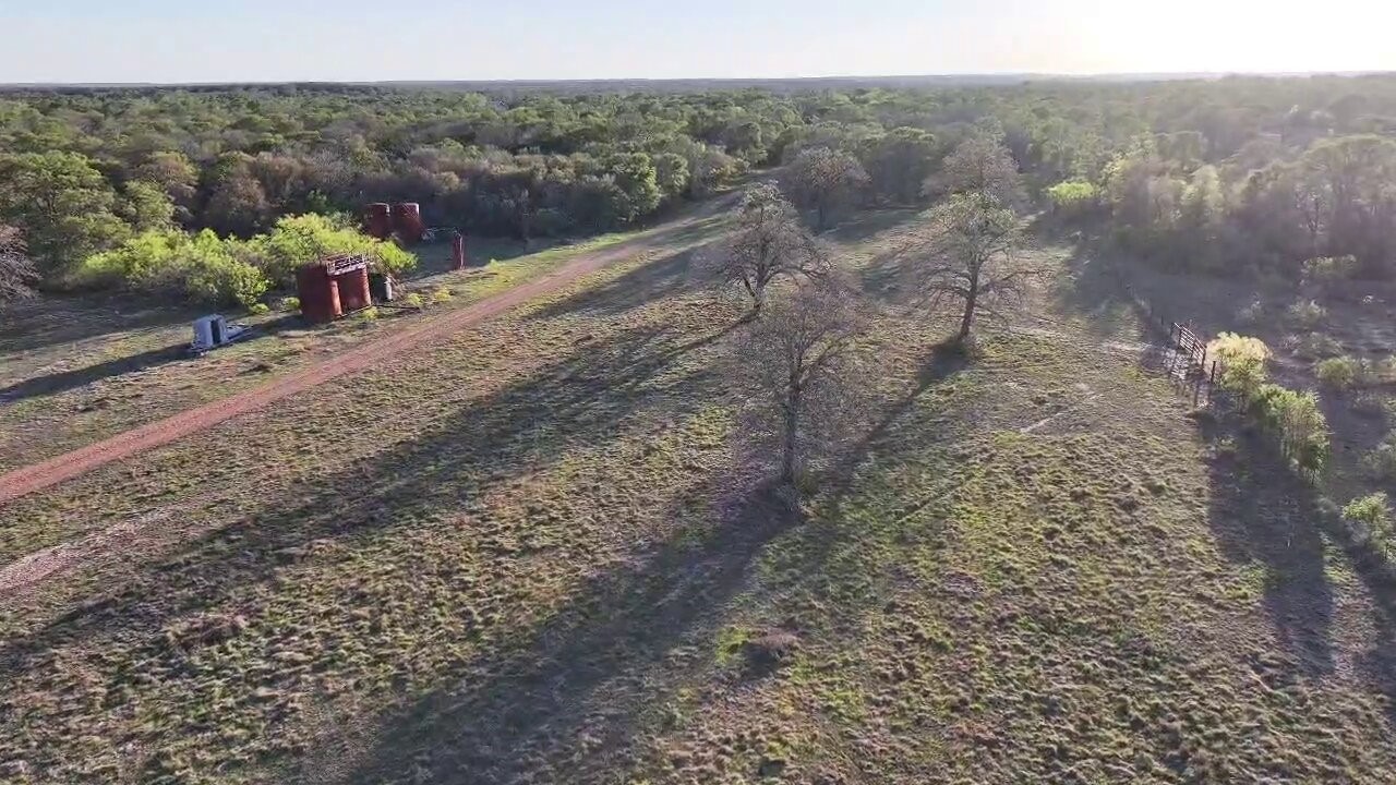 Tbd Lot 3 Tbd Road Paige, TX 78659 - Photo 5 of 15 a view of a dry yard with wooden fence