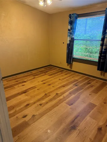 a view of empty room with front door