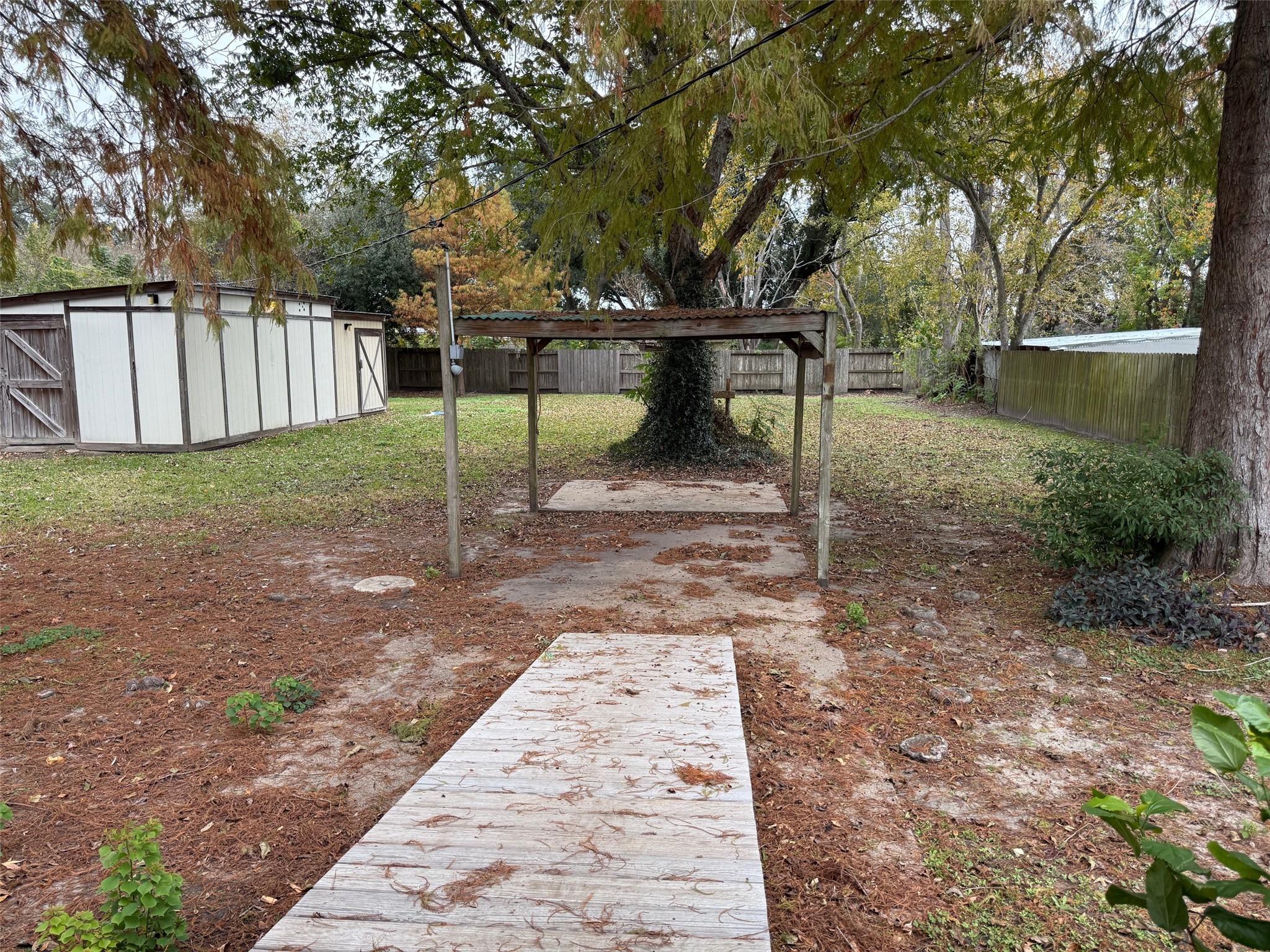 2611 Lilac Street Pasadena, TX 77503 - Photo 19 of 30 a view of a park with large trees
