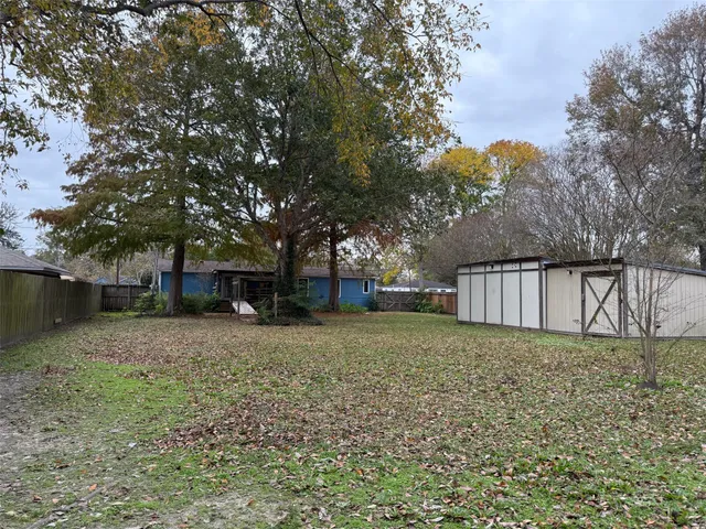 a house view with a backyard space
