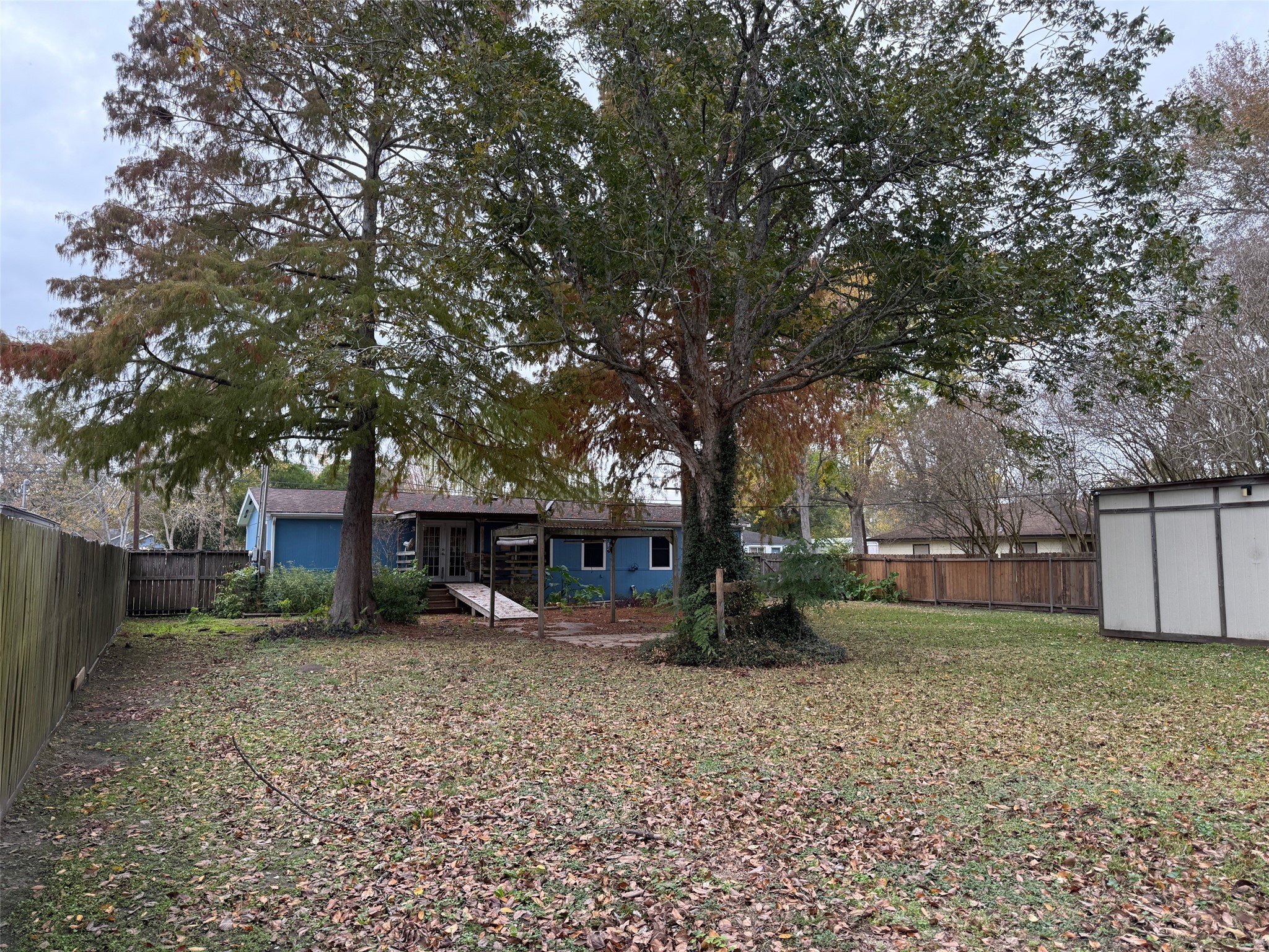 2611 Lilac Street Pasadena, TX 77503 - Photo 27 of 30 a view of a house with a yard