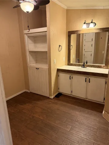 a view of a double sink and a mirror